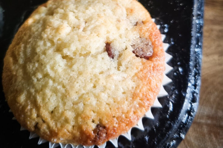 close up of gluten free banana chocolate chip muffins straight out of the oven